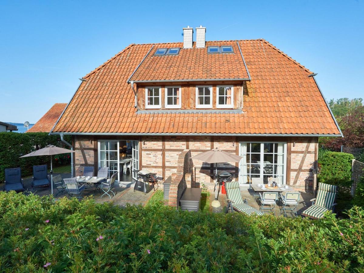 Fachwerkhäuser Seedorf F591 Haushälfte Sophie Charlott mit Kamin und Terrasse Exterior foto
